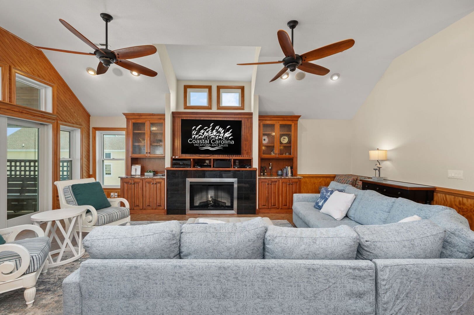 Spacious living room with fireplace.