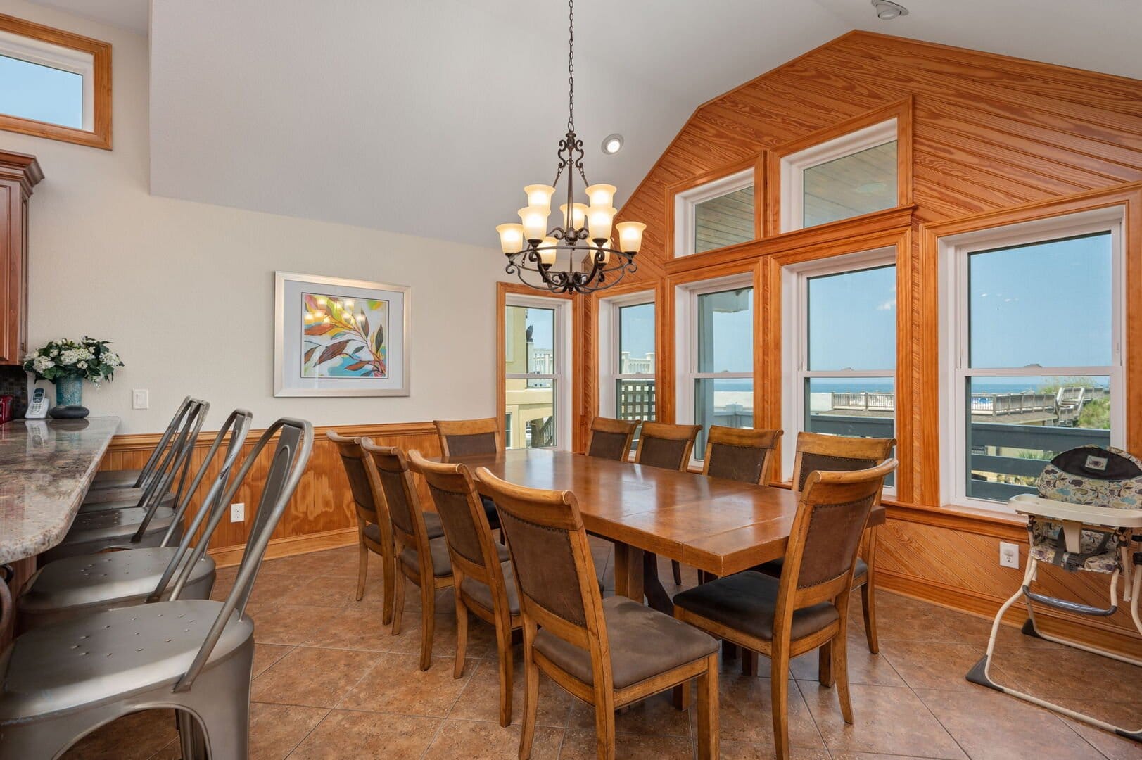 Dining room with large windows.