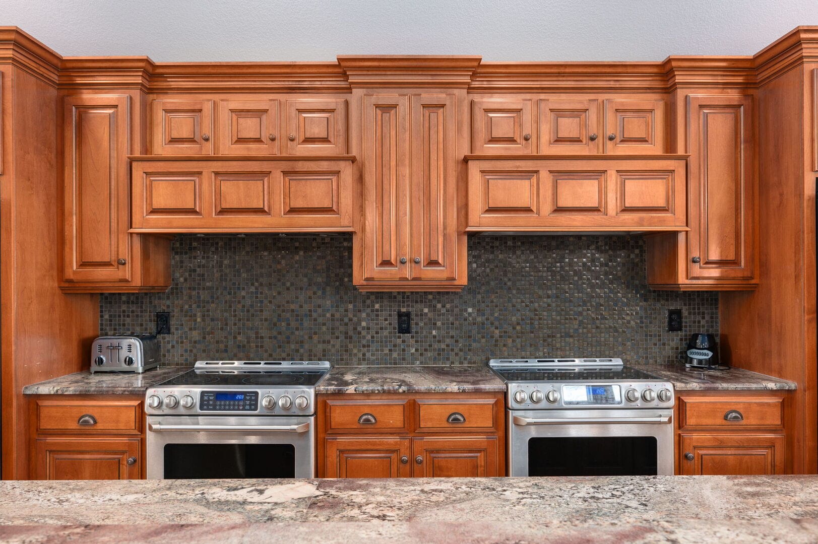 Wooden kitchen cabinets with appliances.