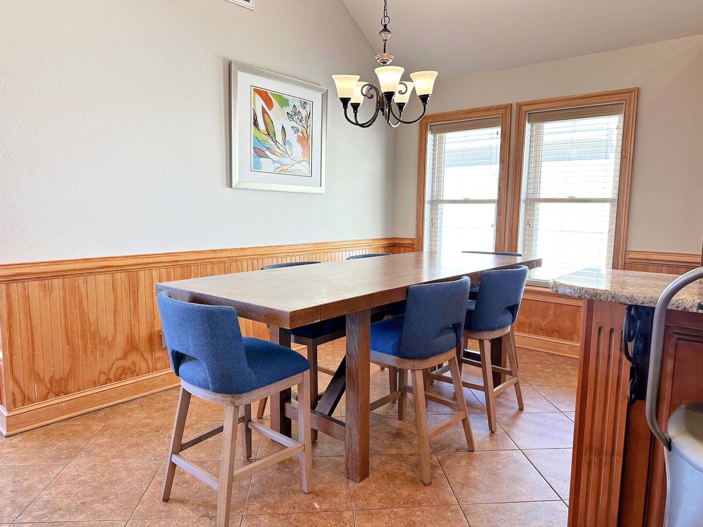 Dining area with table and chairs.