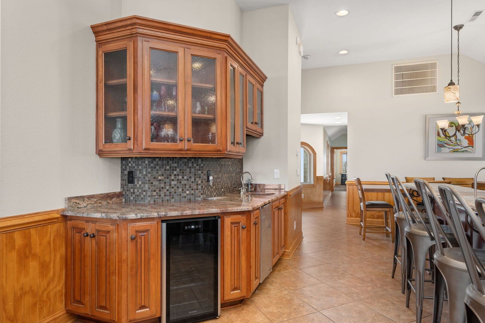 Kitchen corner with wooden cabinets.