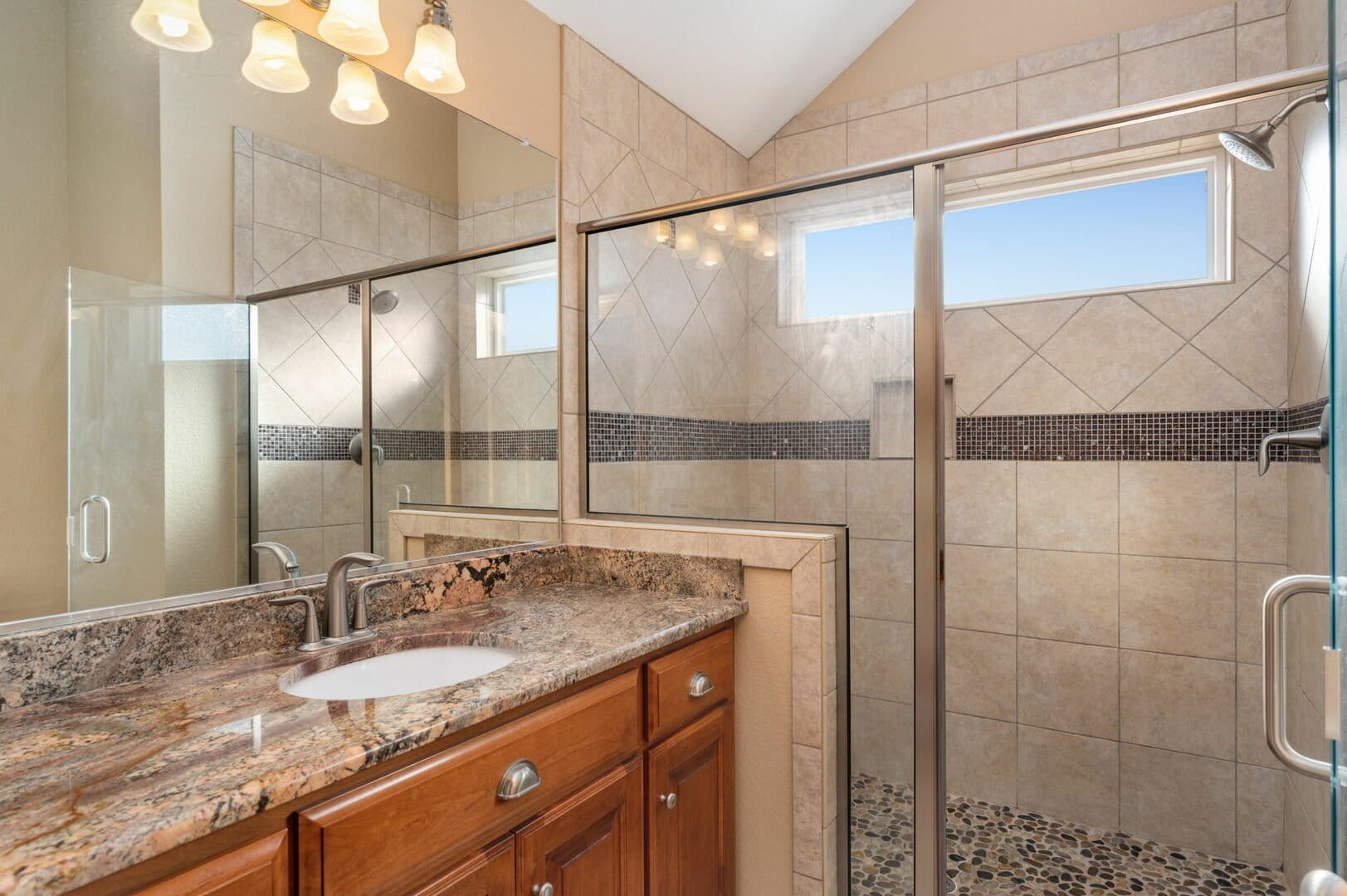 Modern bathroom with glass shower.