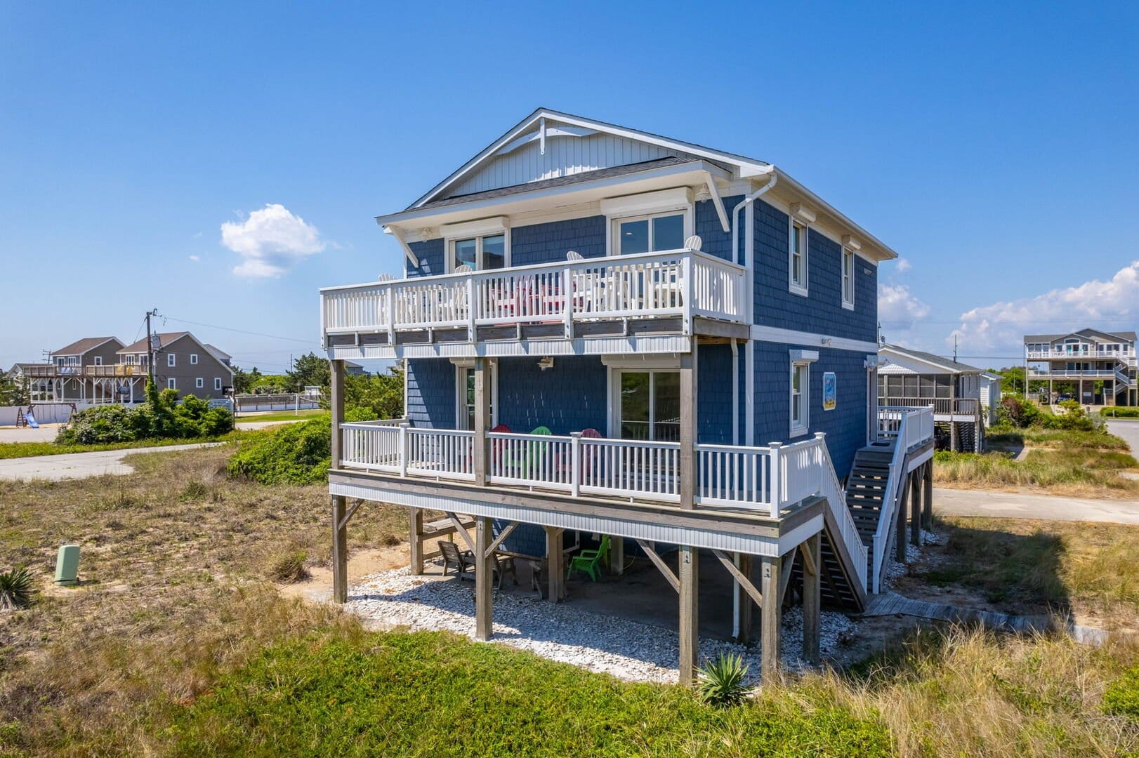Two-story house on stilts.
