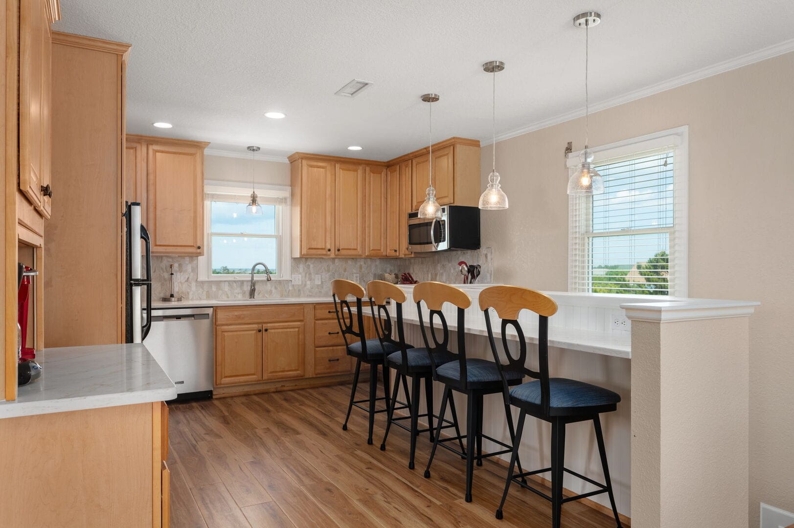 Modern kitchen with wooden cabinets.