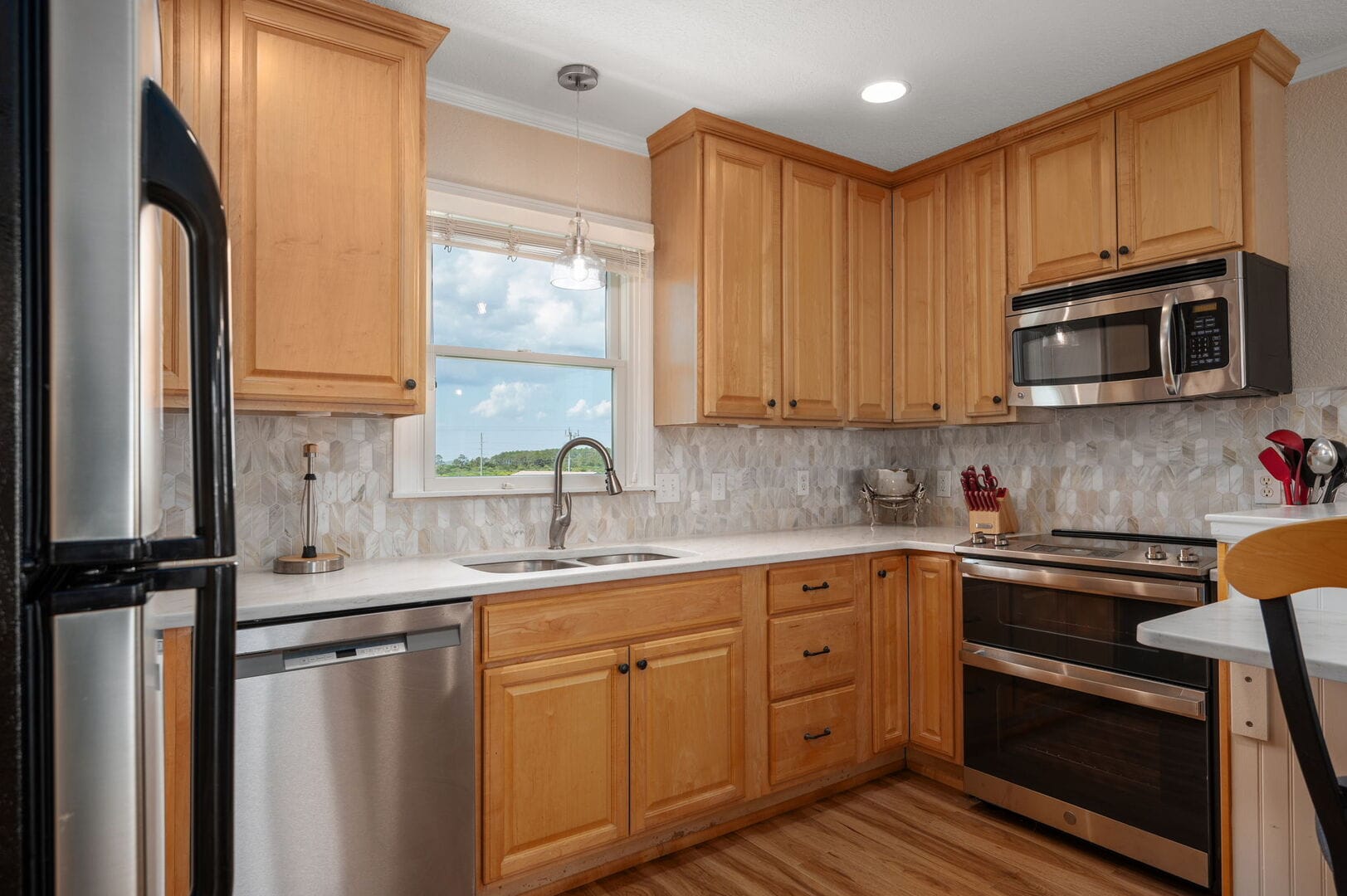 Modern kitchen with wood cabinets.