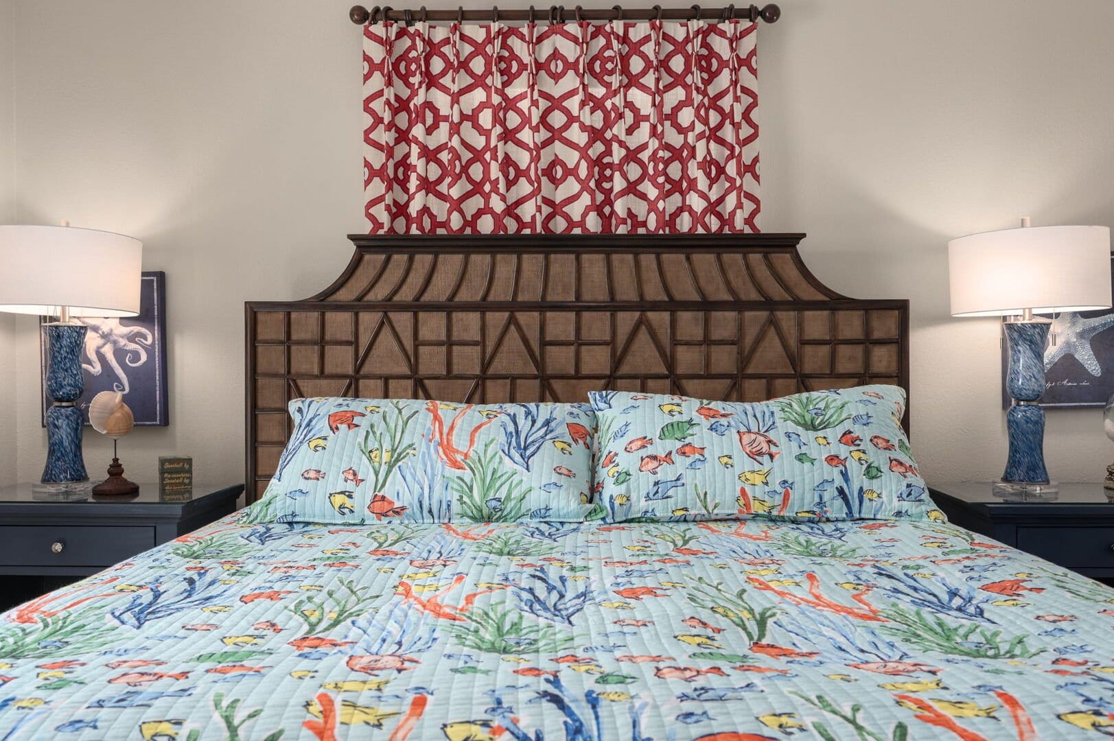 Colorful bedding in nautical-themed bedroom.