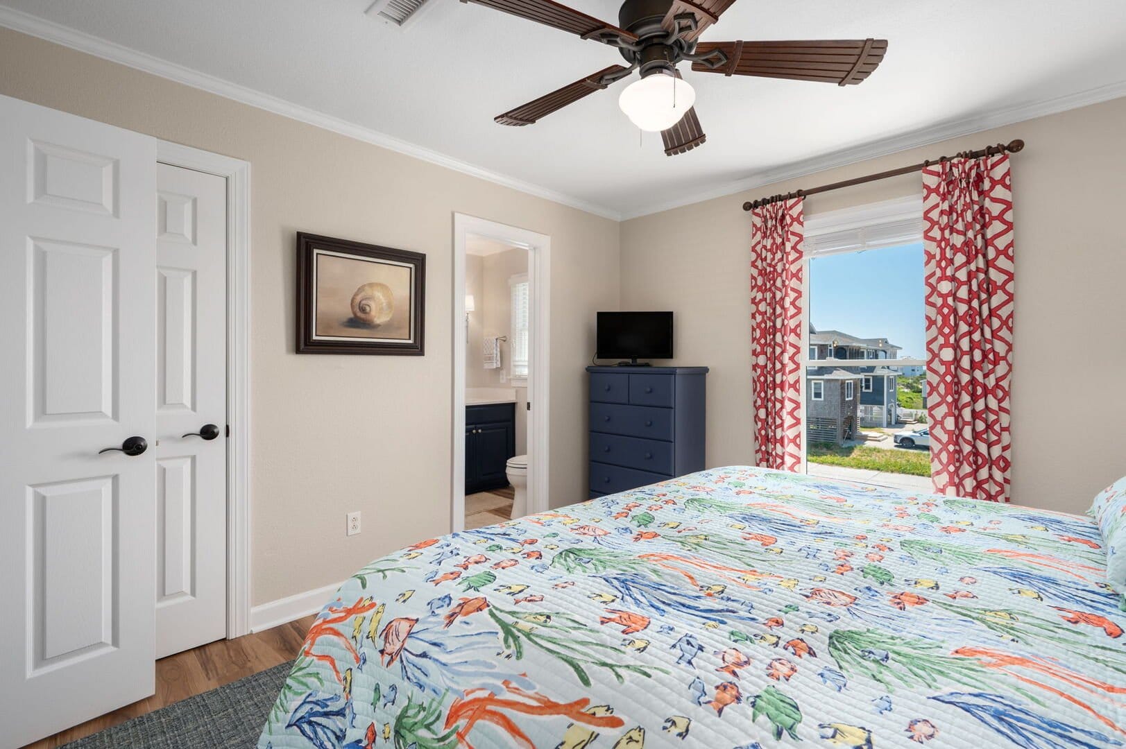 Bright bedroom with colorful decor.