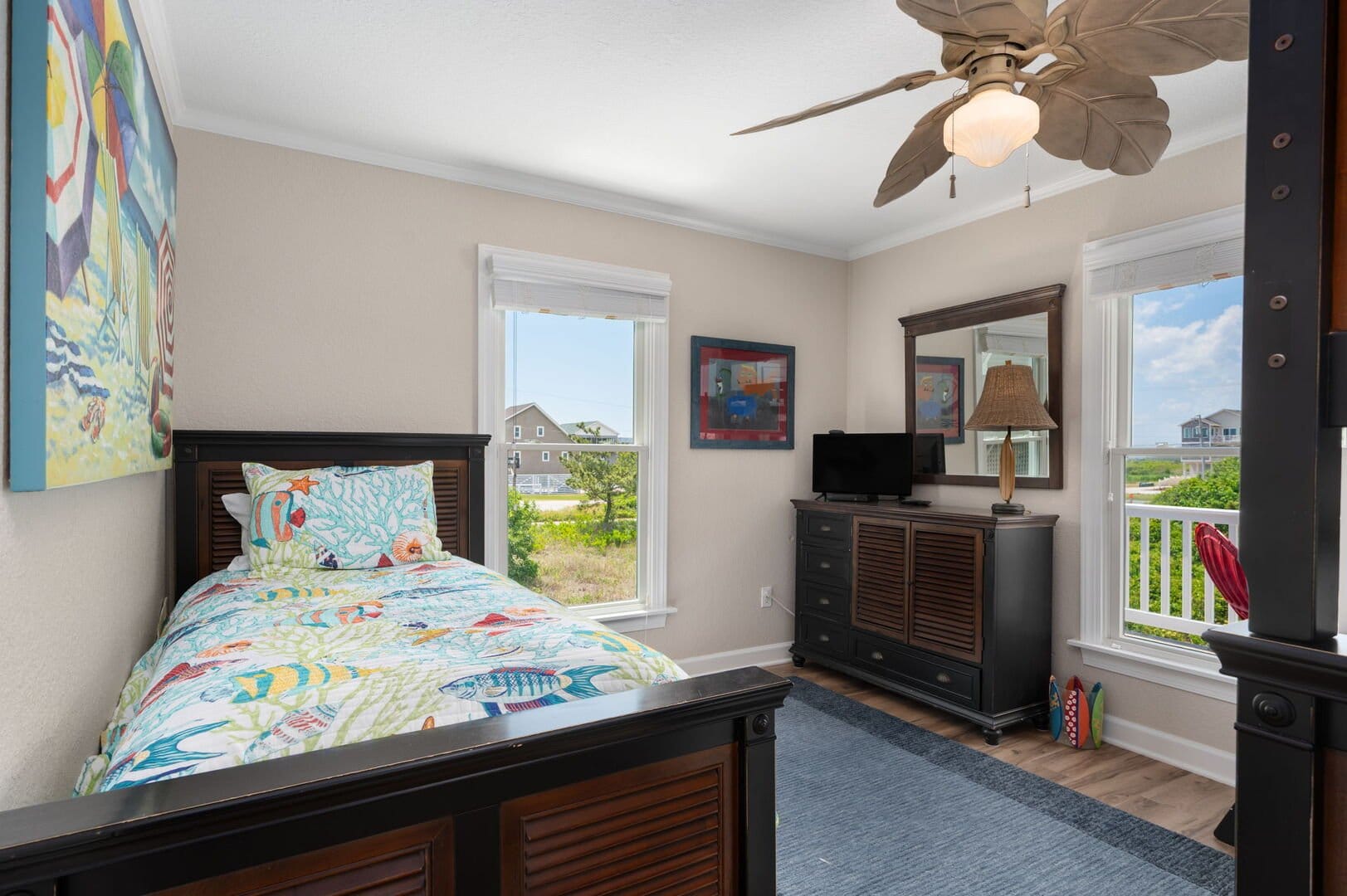Bedroom with beach-themed decor.
