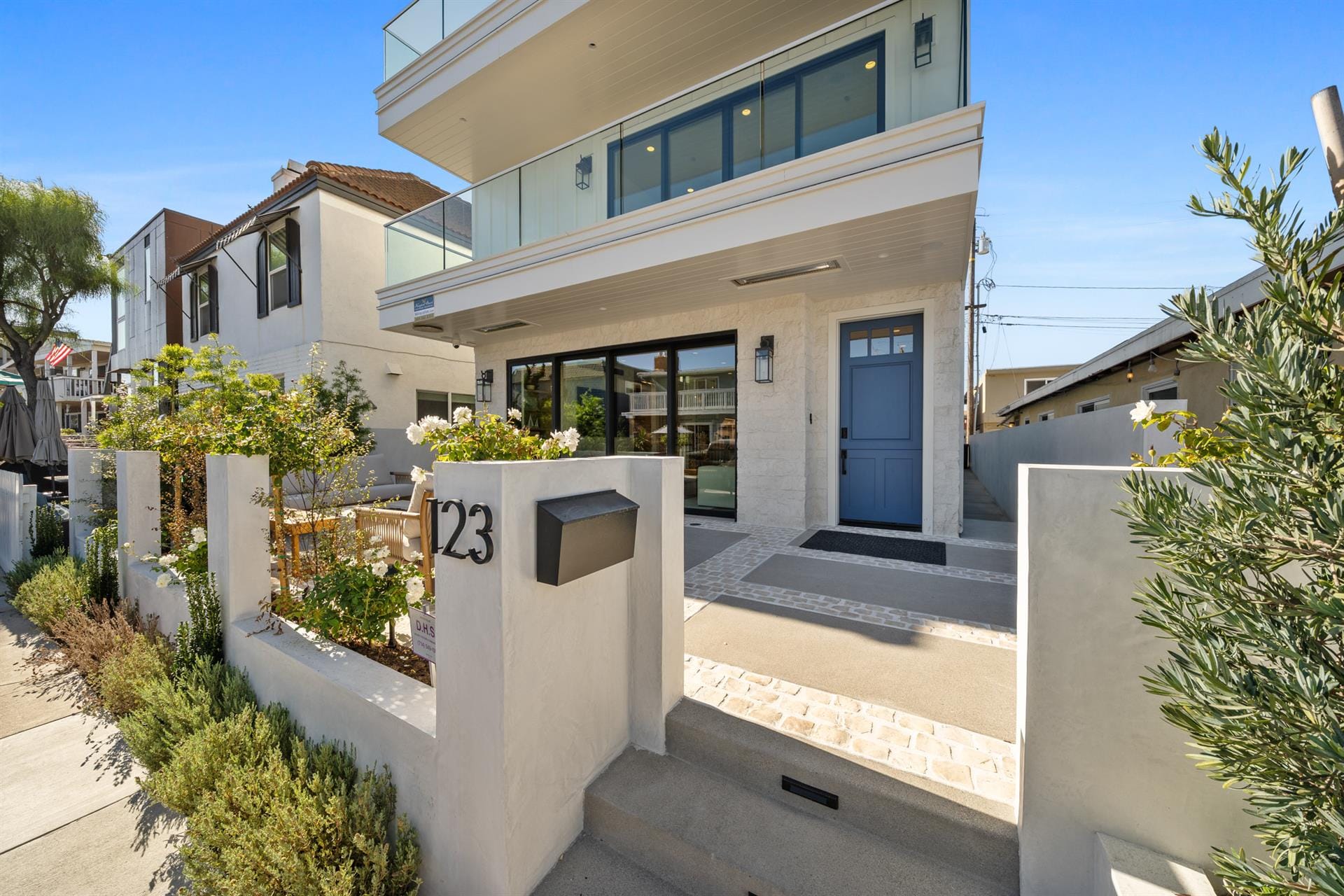 Modern house with blue door.