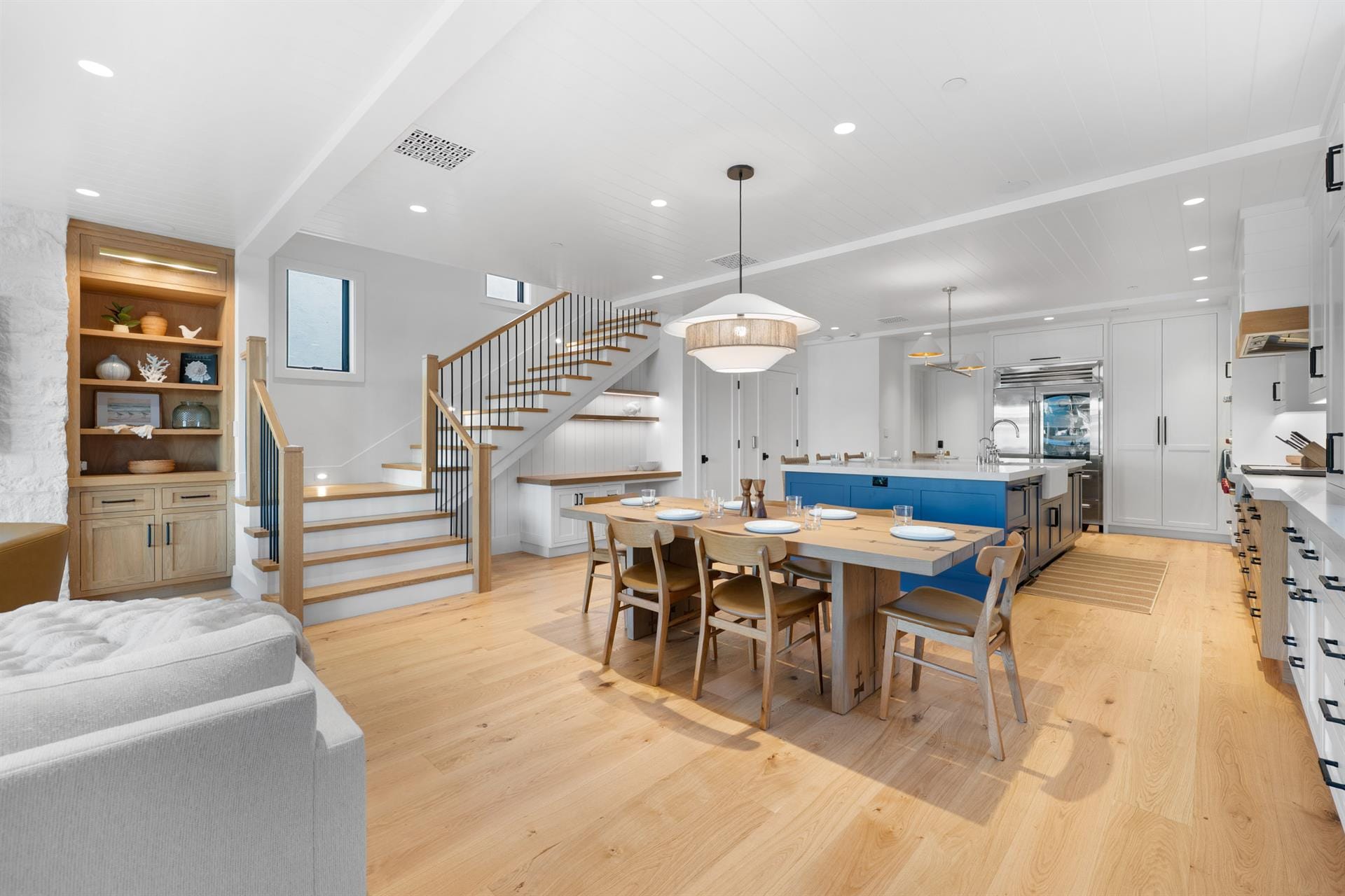 Modern kitchen with dining area.