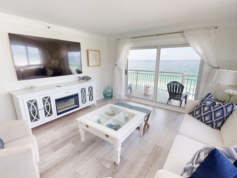 Beachfront living room with ocean view.
