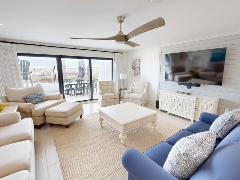 Comfortable modern living room with balcony.