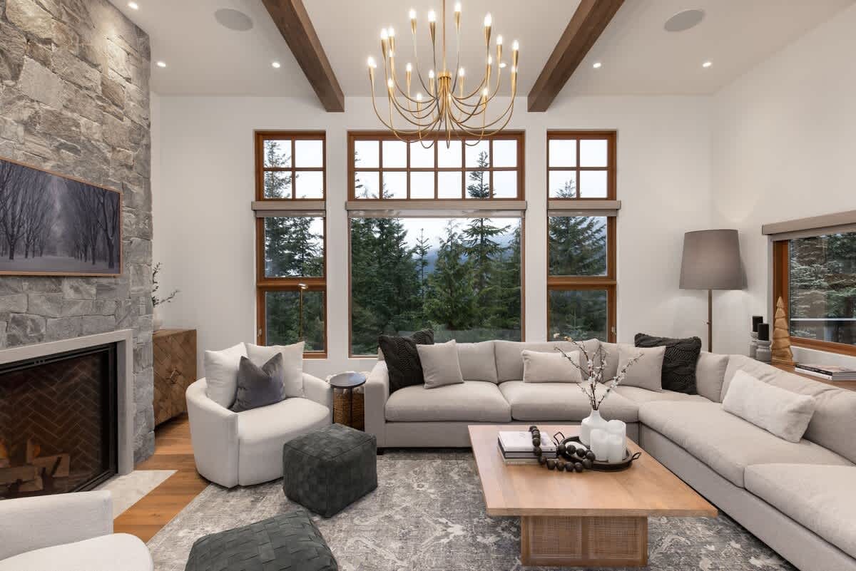 Modern living room with forest view.