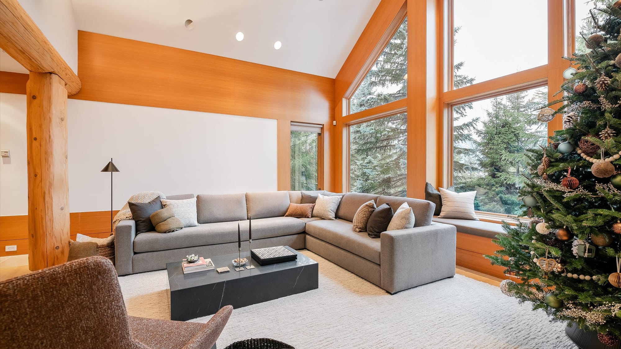 Modern living room with Christmas tree.