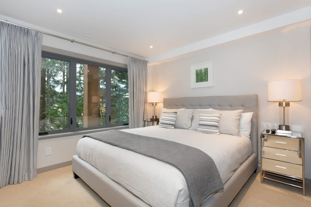 Modern bedroom with large bed.