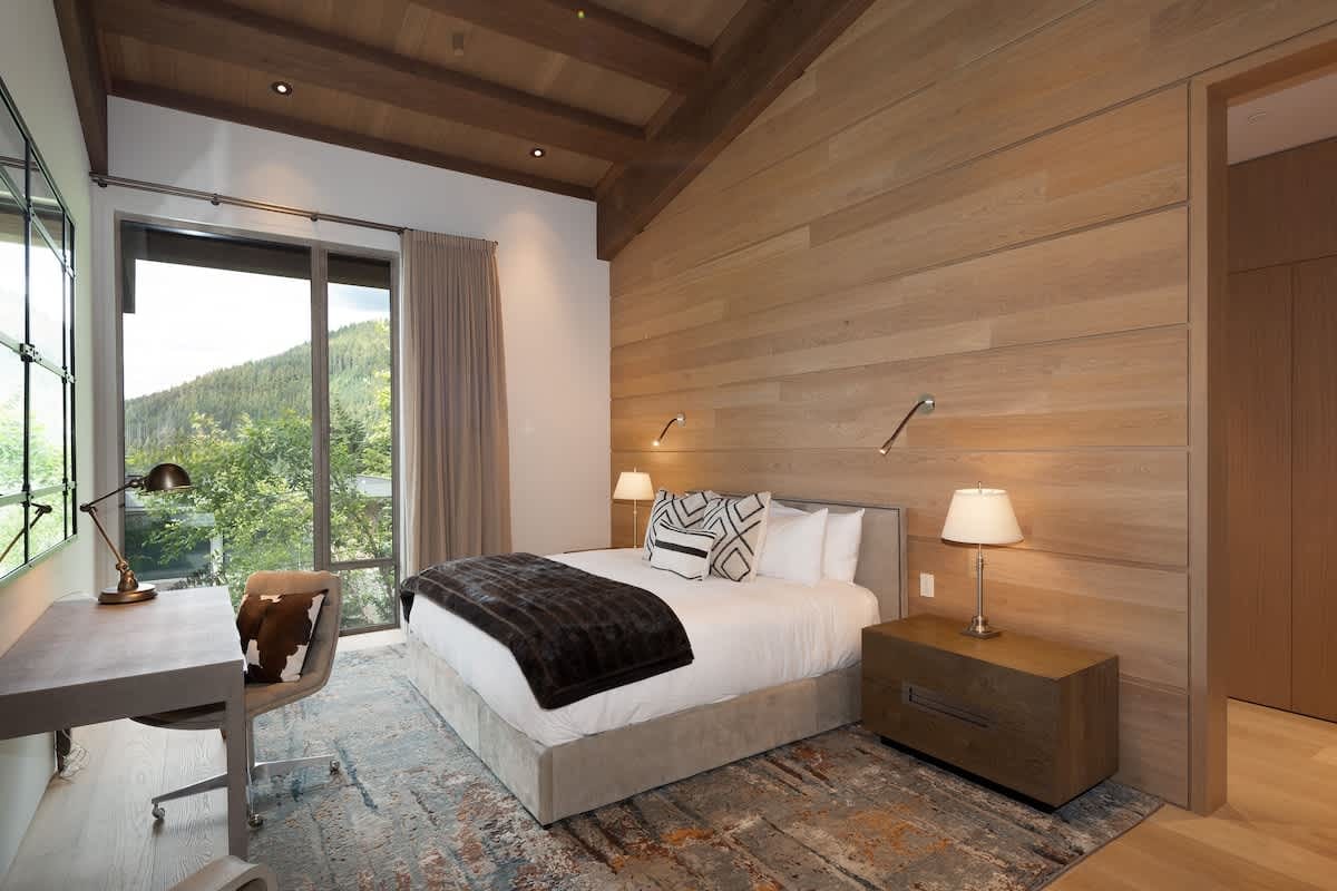 Modern bedroom with wooden accents.