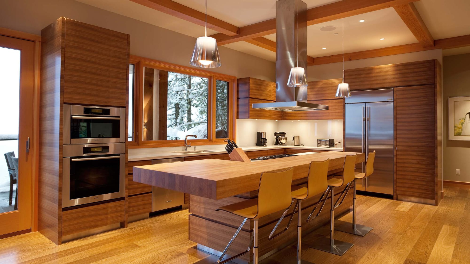 Modern kitchen with wood accents.