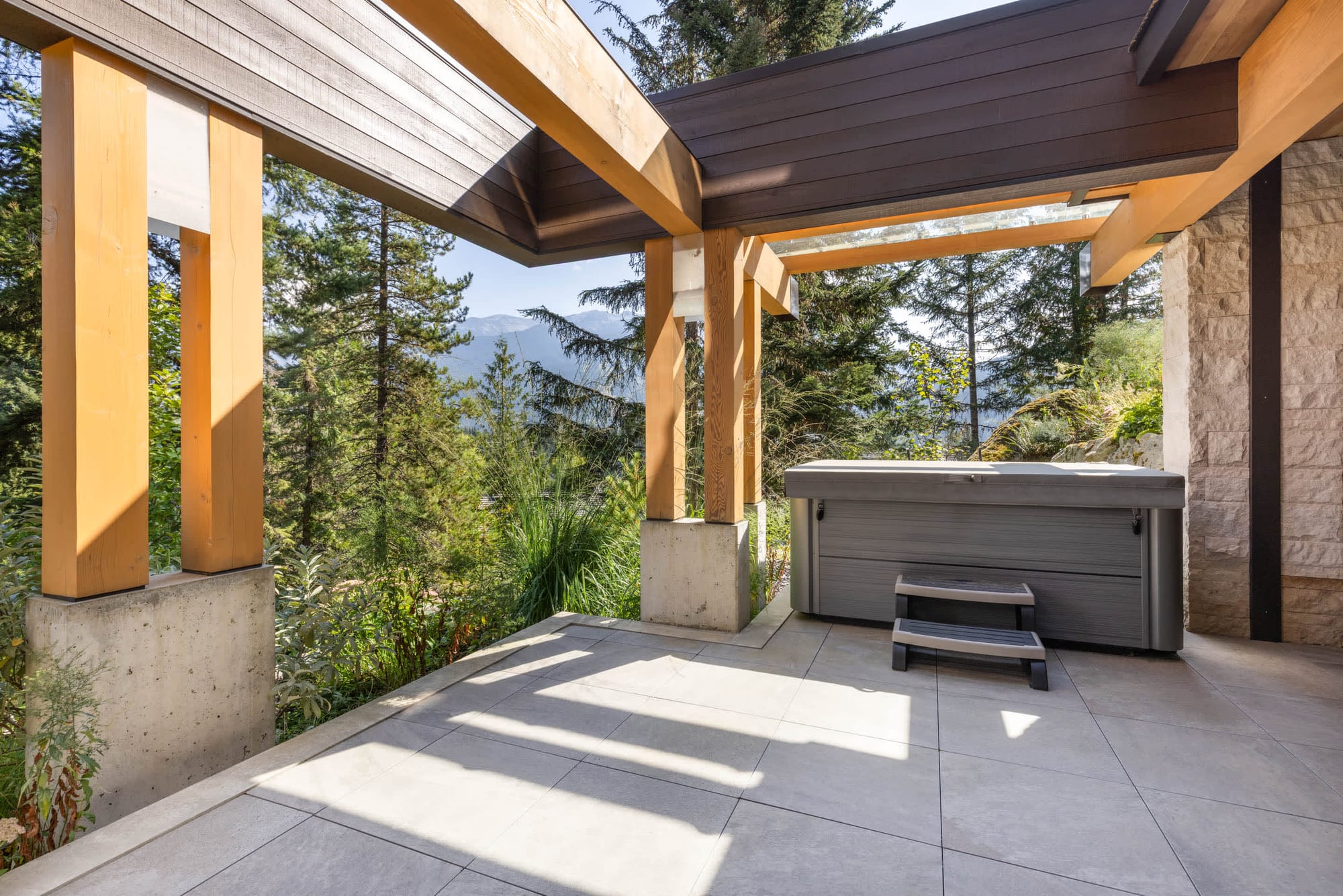 Outdoor hot tub with scenic view.