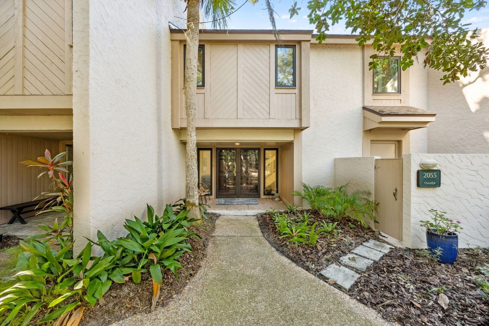 Modern house entrance with plants.