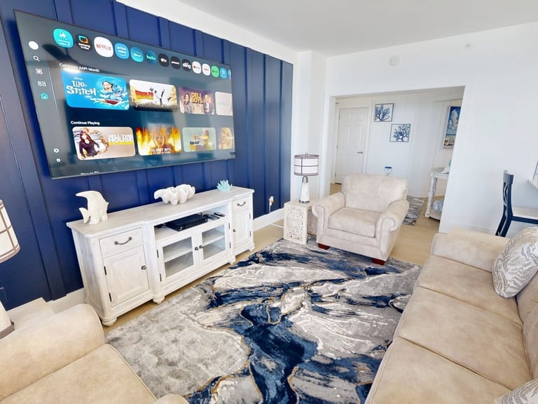Living room with TV and couch.