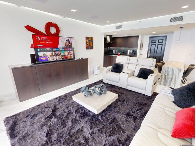 Modern living room with entertainment setup.