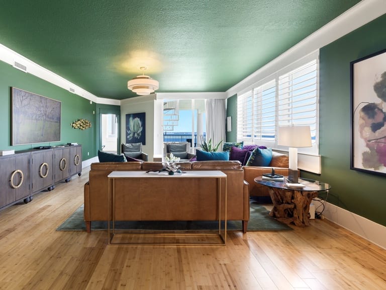 Modern green-themed living room.