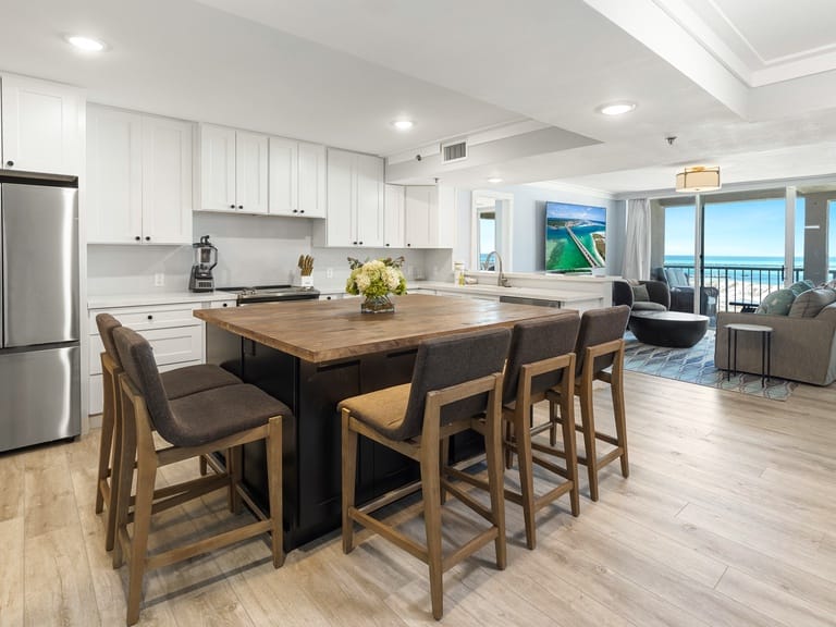 Modern kitchen and living room view.