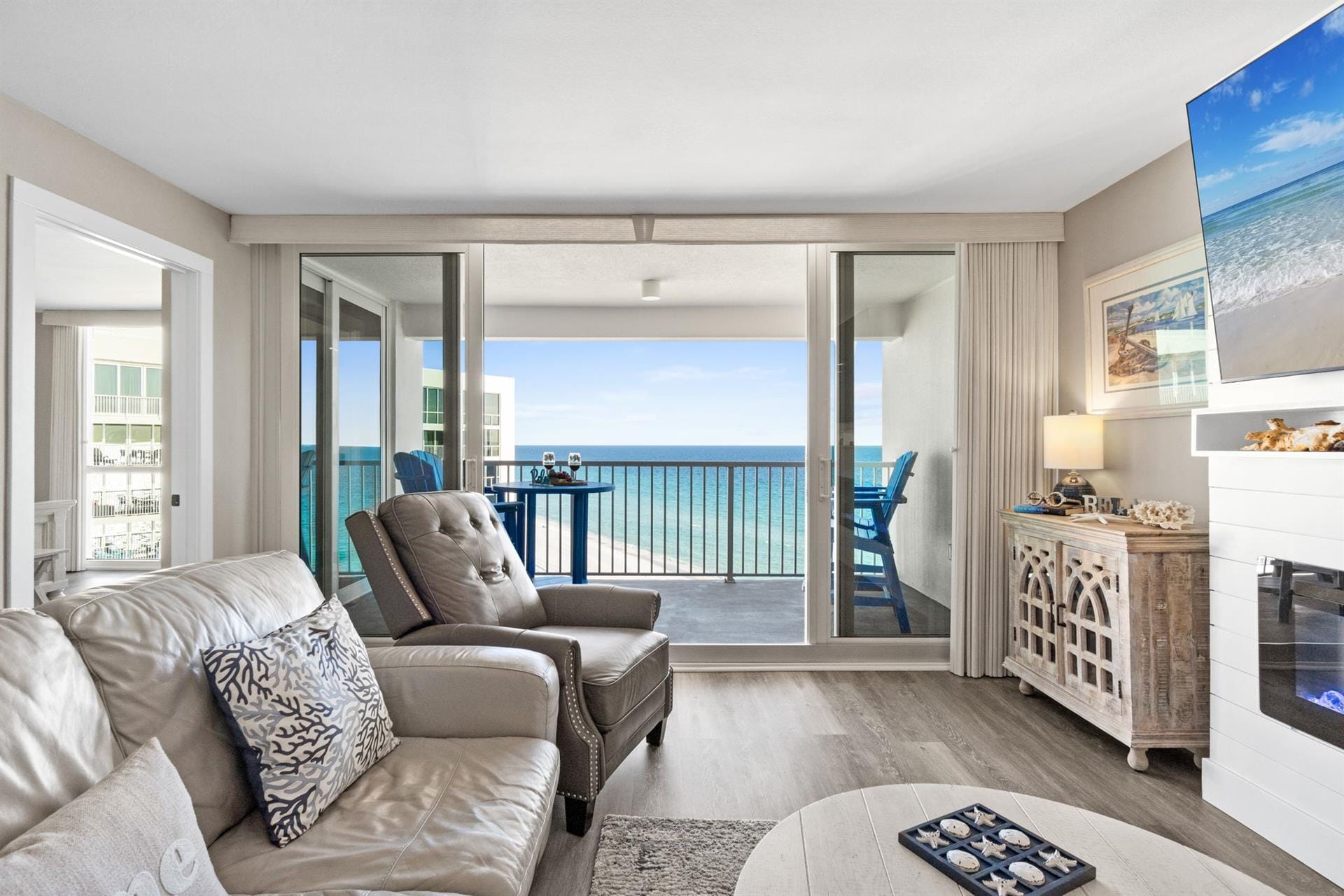 Ocean-view living room with balcony.