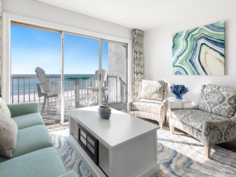 Beachfront living room with ocean view.